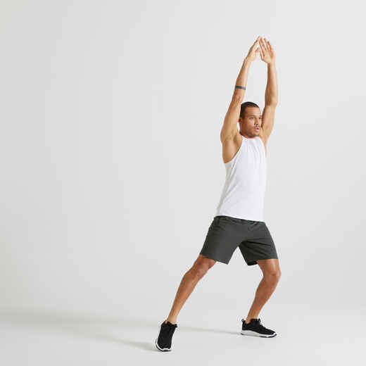 
      Débardeur de fitness essentiel respirant col rond homme - blanc
  