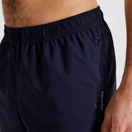 Pantalón corto short con bolsillo Hombre Domyos FST 120 azul