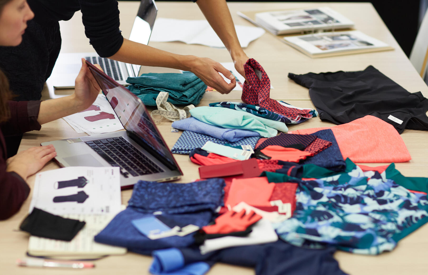 Picture of people choosing fabrics