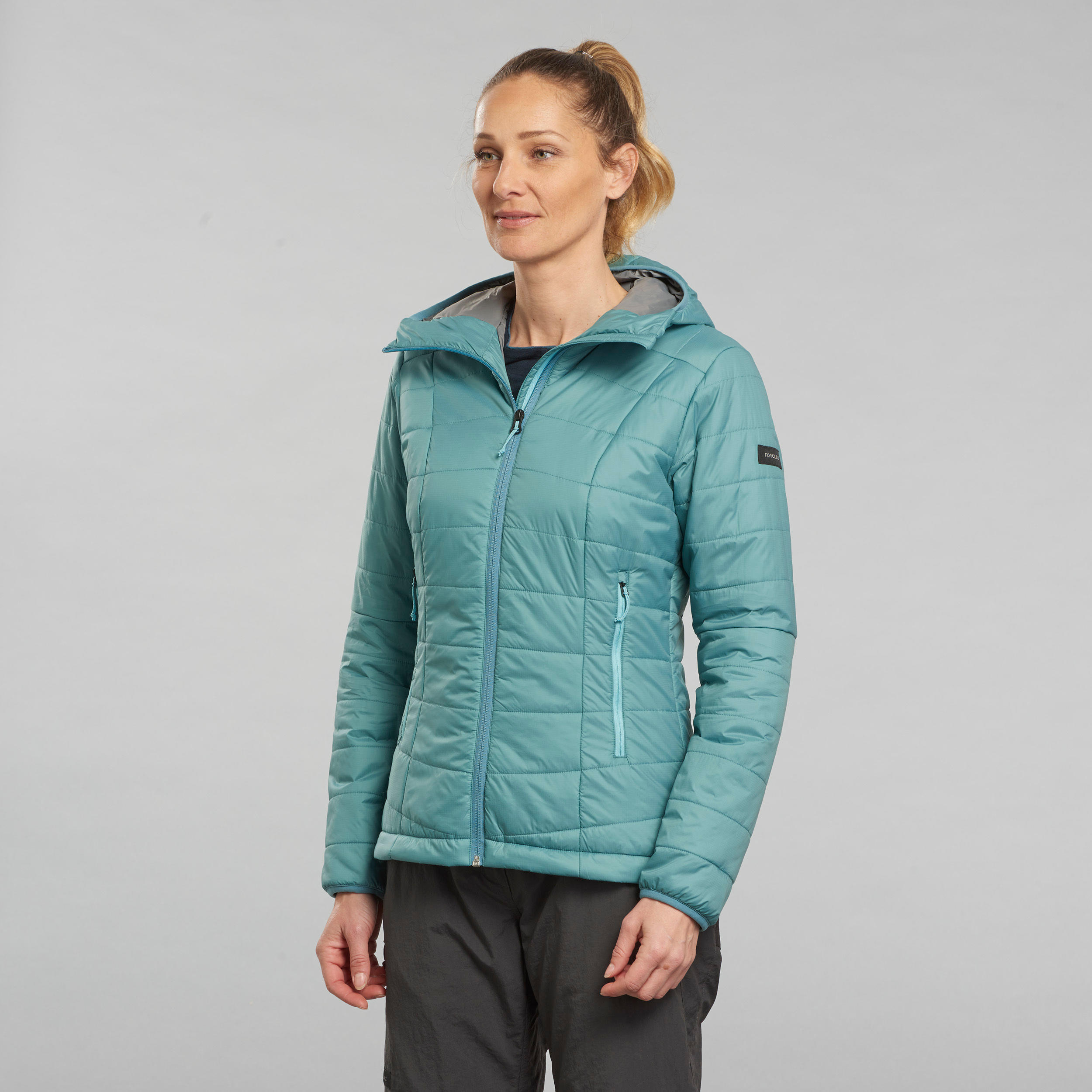 FORCLAZ Wattierte Jacke Damen Synthetik Kapuze Trekking - MT100 blau 