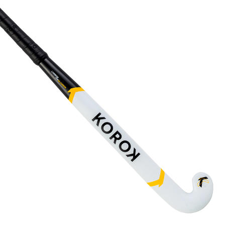 Landhockeyklubba avancerad low bow 60 % kolfiber FH560 vuxen vit gul