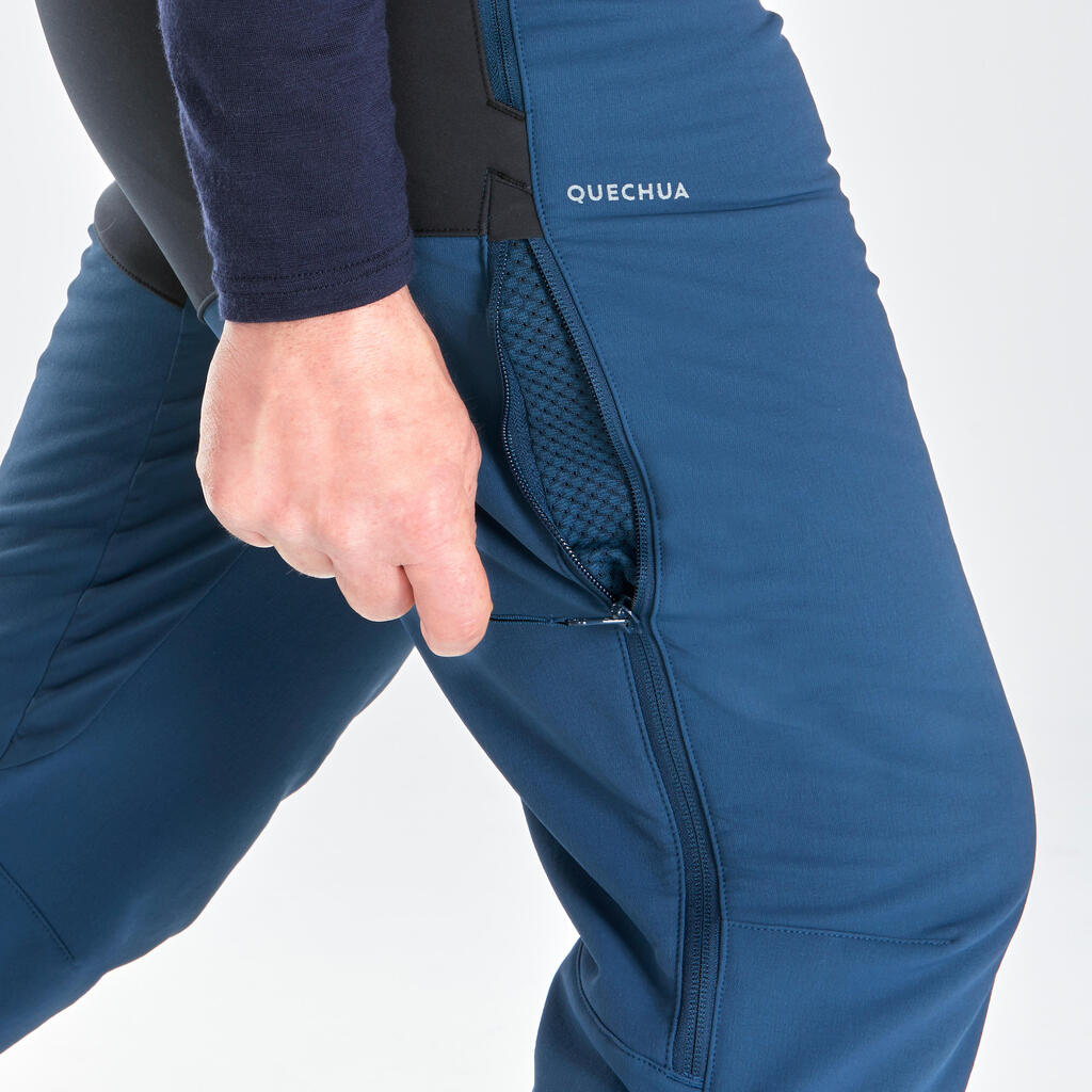 Pánske hrejivé vodoodolné strečové nohavice SH520 X-Warm na turistiku + návleky
