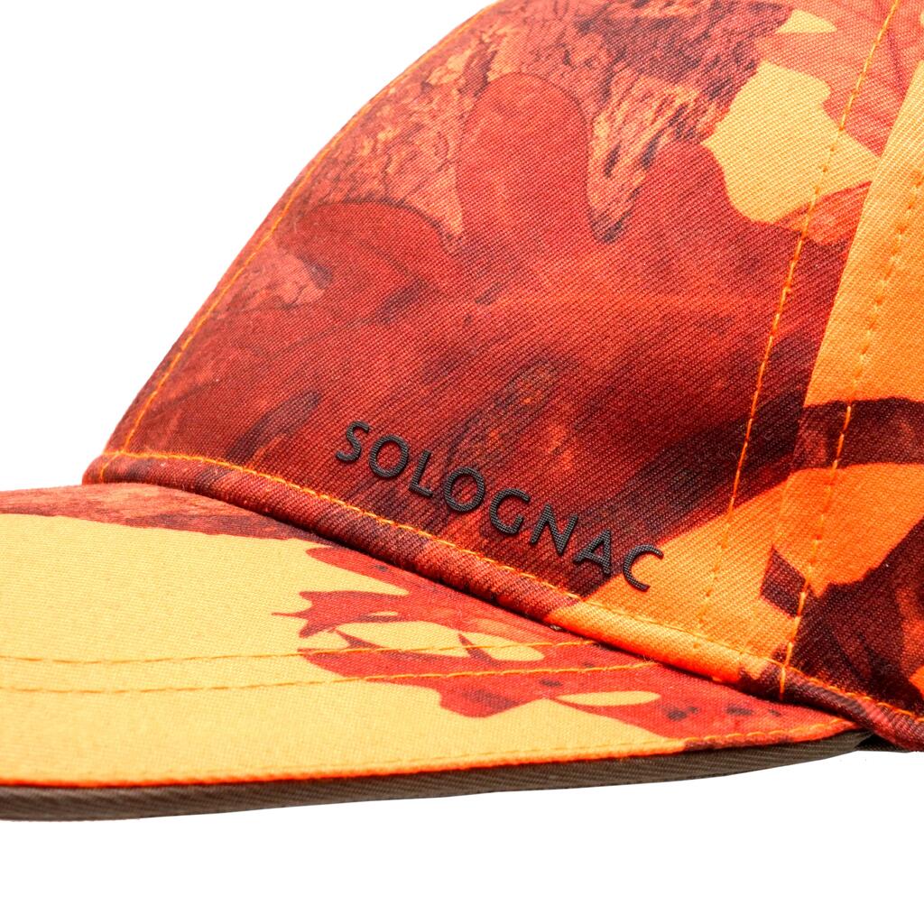 Maskirna oranžna lovska kapa s šiltom 500 