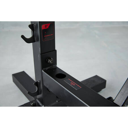 Tiltable and foldable weight bench with adjustable pegs