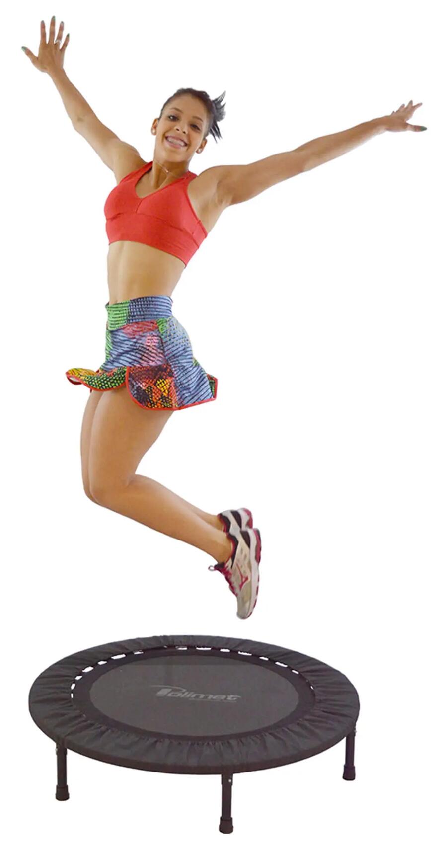 girl jumping on mini trampoline