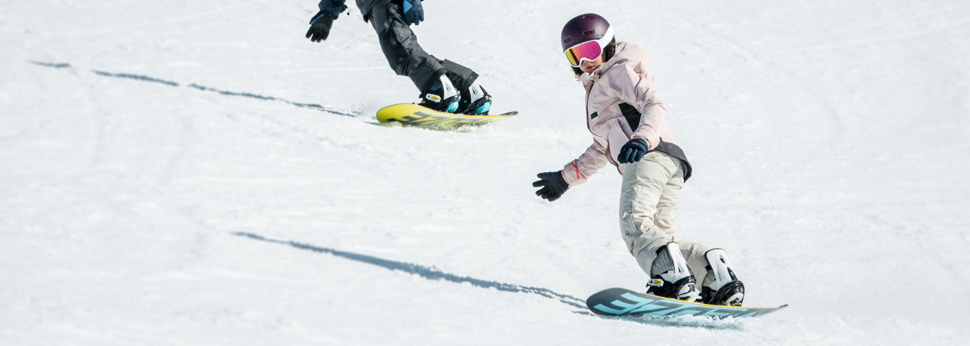 Apprendre aux enfants à faire du snowboard