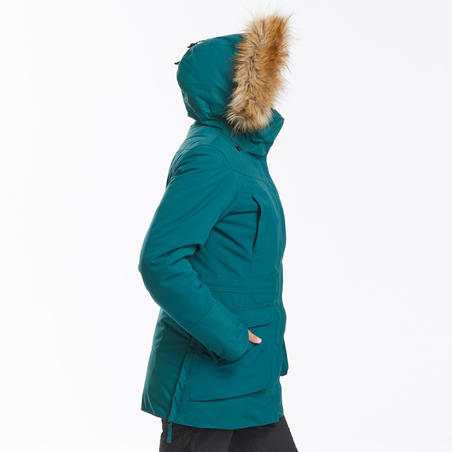 Куртка жіноча SH500 U-Warm для туризму, водонепроникна – Зелена