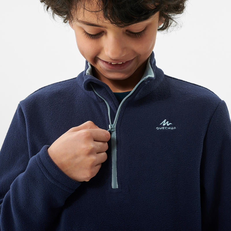 เสื้อแจ็คเก็ตเดินป่าผ้าฟลีซสำหรับเด็กอายุ 7-15 ปีรุ่น MH100 (สีกรมท่า)
