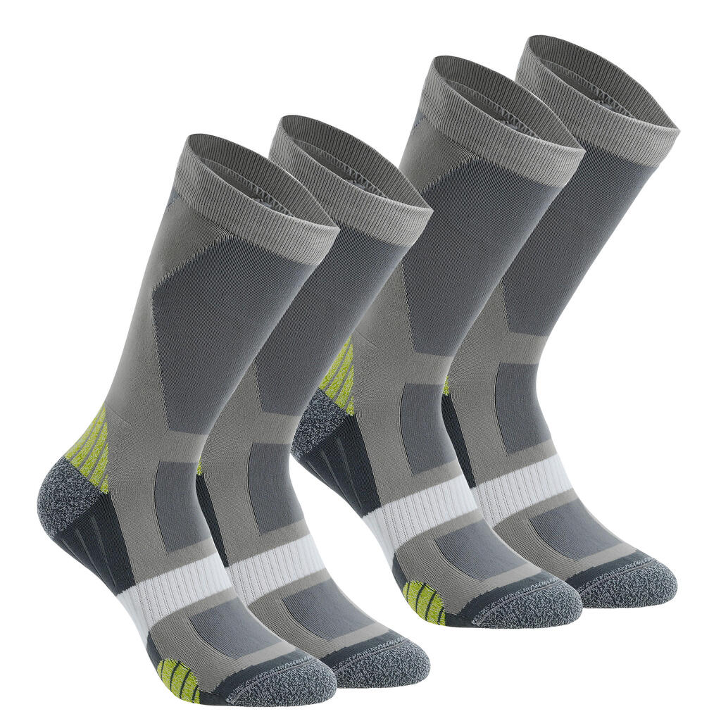 2 pairs of forclaz mid 500 high rise socks - light grey and green.