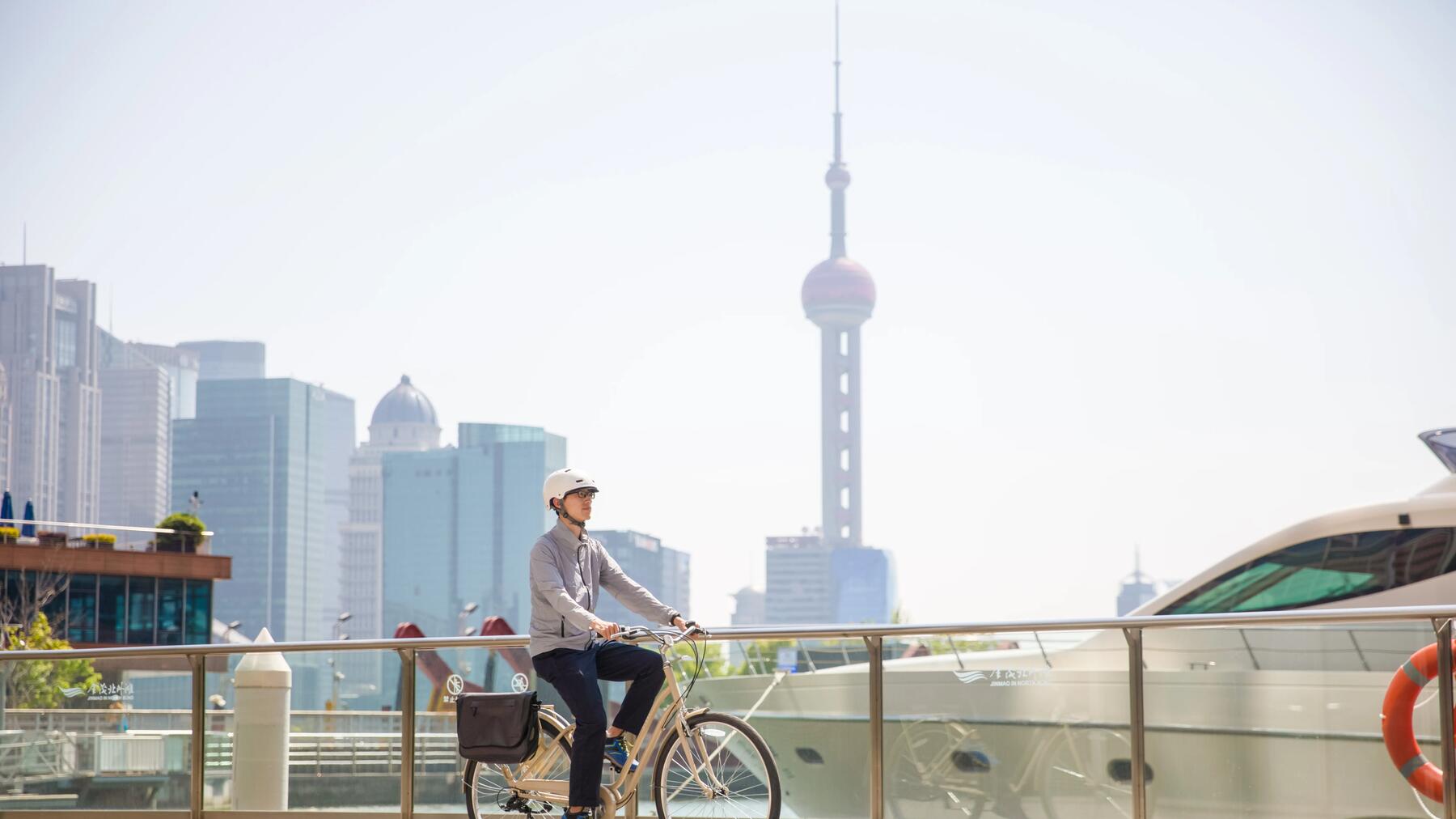 3 cyclists ride on the road