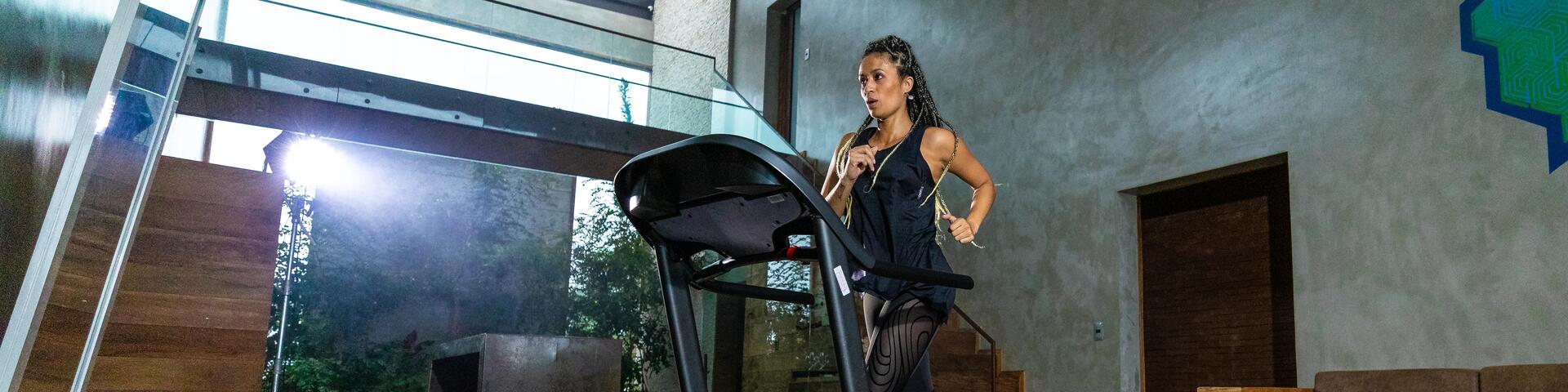 Women on a treadmill doing cardio