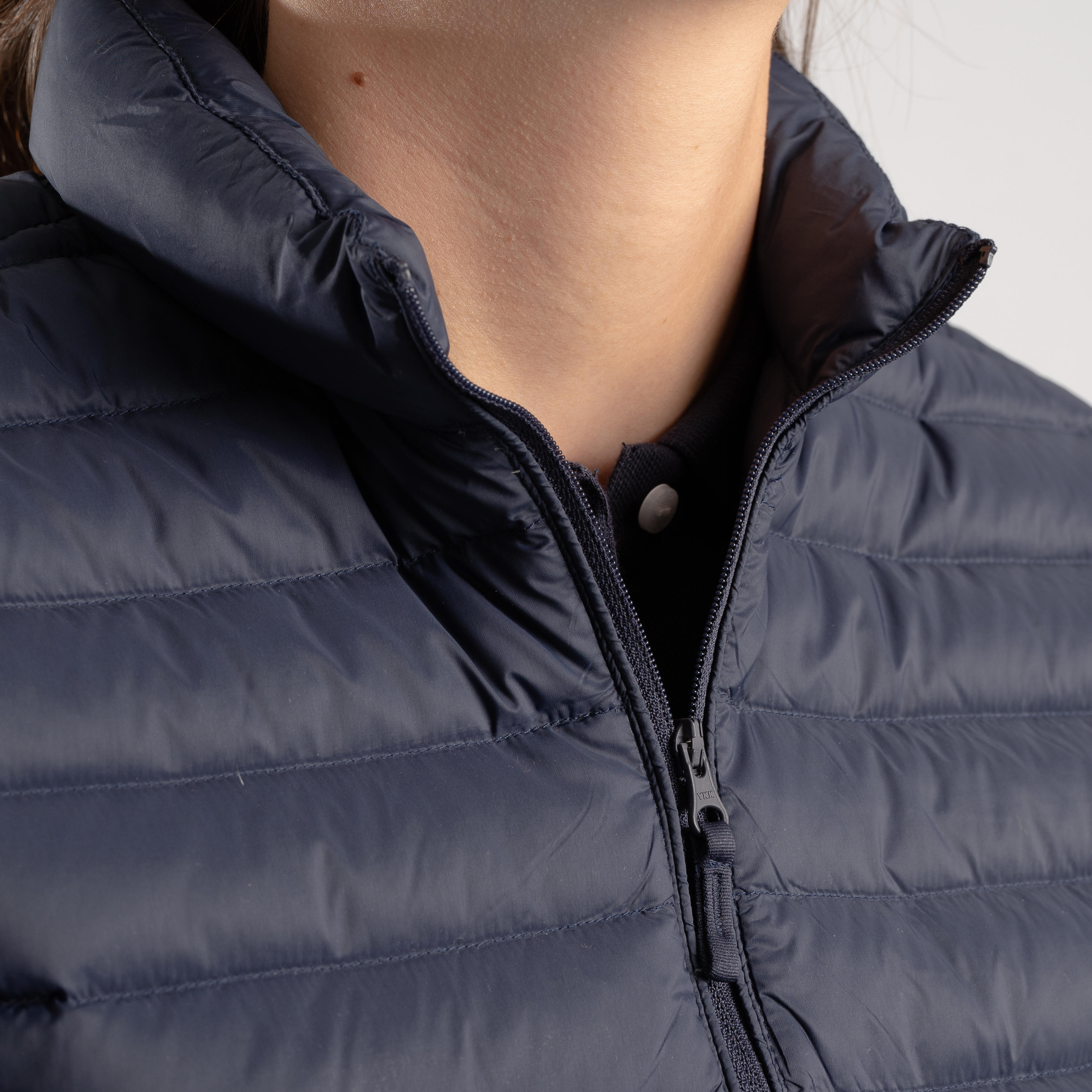 Women s golf sleeveless down jacket MW500 navy blue