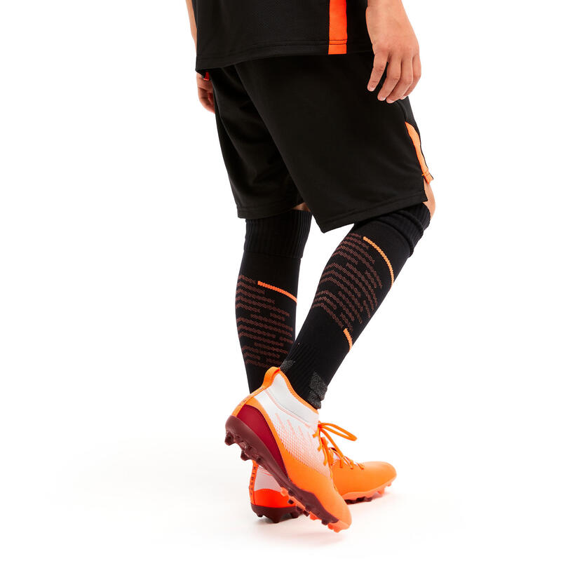 Pantalón corto de fútbol Niños Kipsta CLR negro y naranja