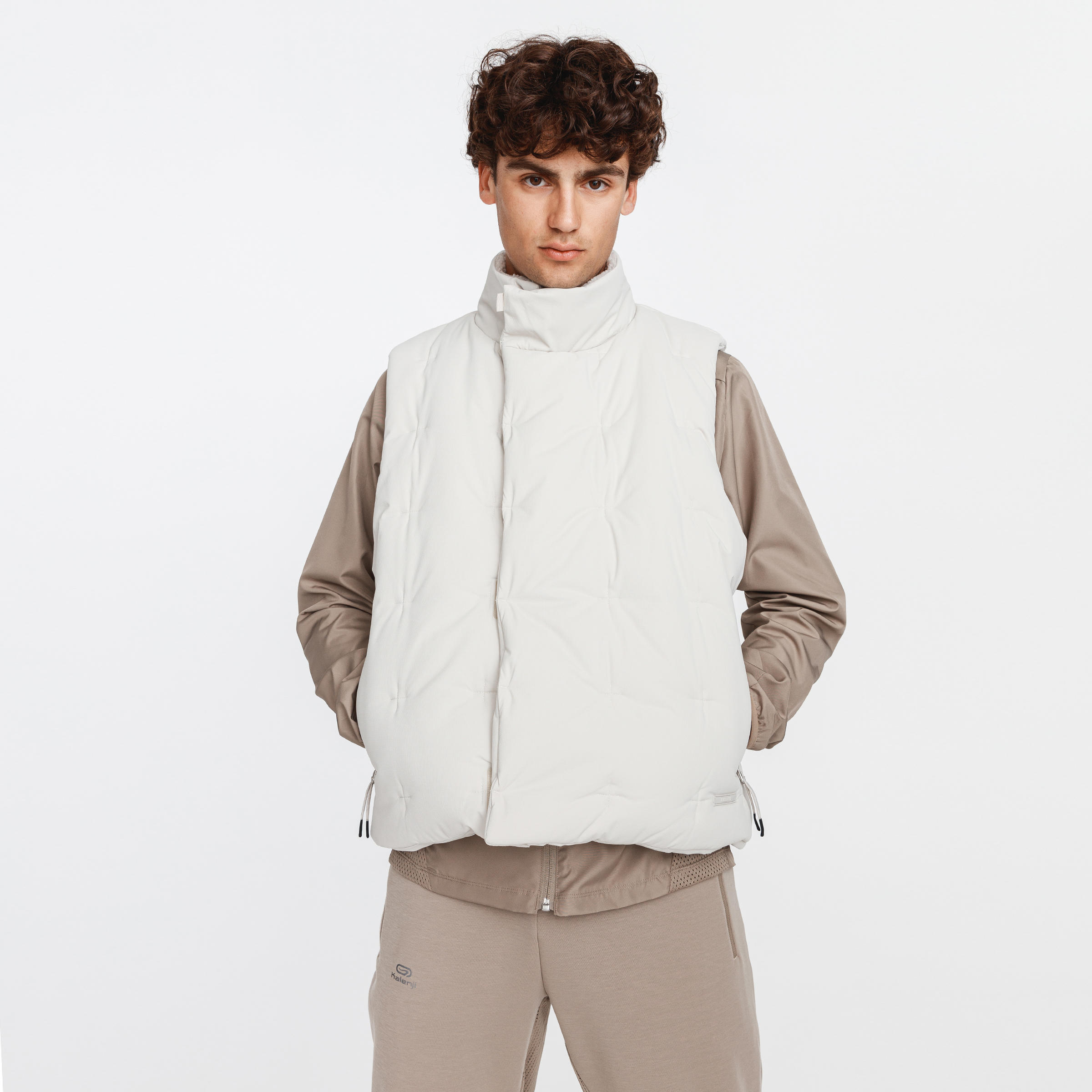 Piumino smanicato running uomo WARM + verde militare KALENJI | DECATHLON