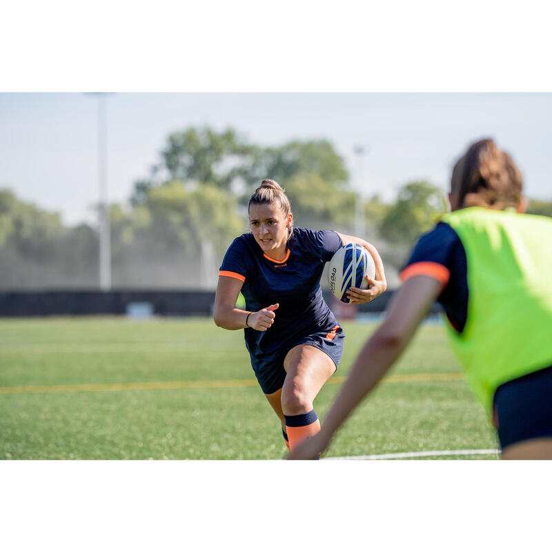 Camiseta de rugby manga corta Offload R100 mujer azul y naranja