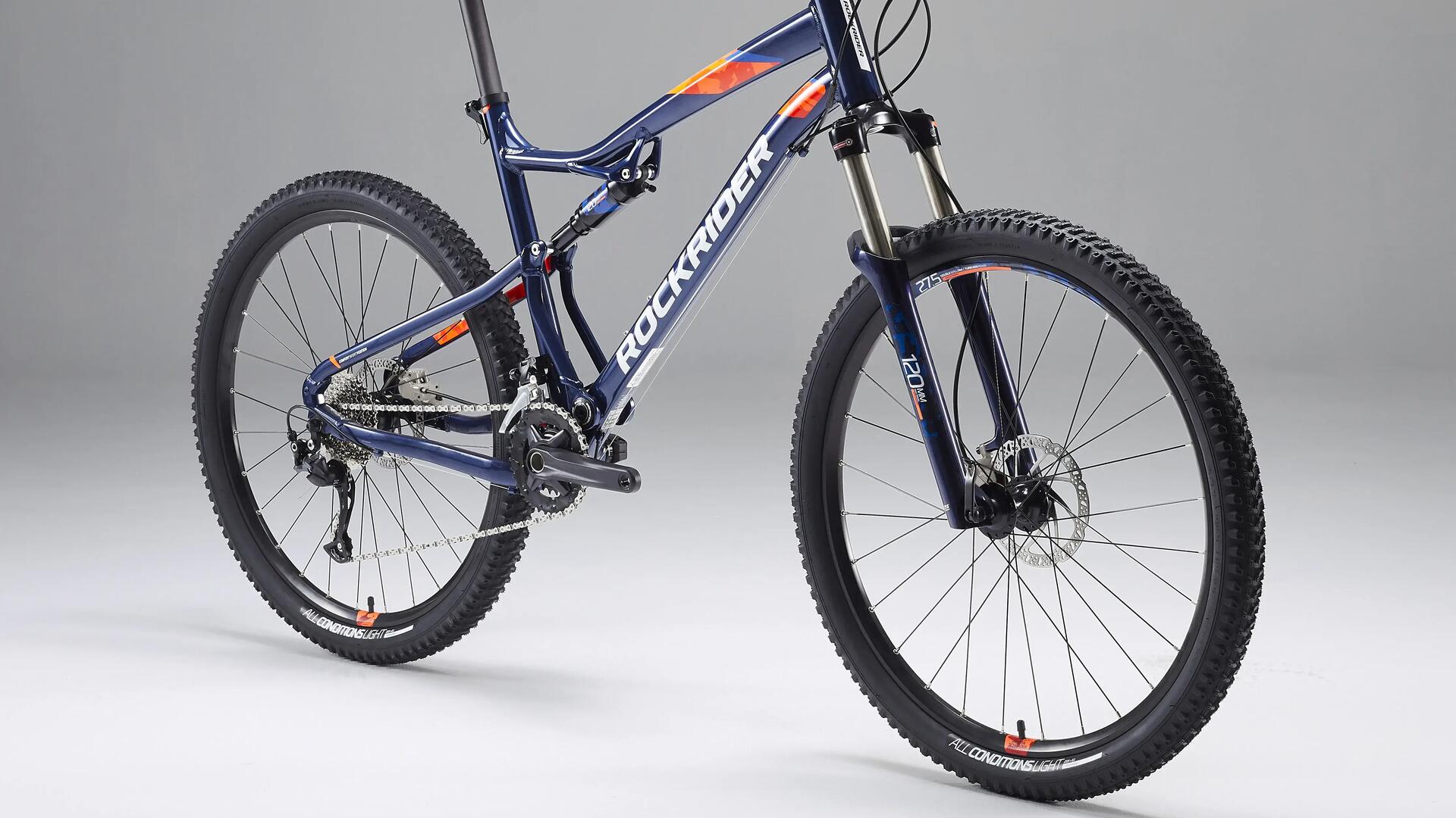 Bicicletă MTB ROCKRIDER ST 540 S ALBASTRU-PORTOCALIU