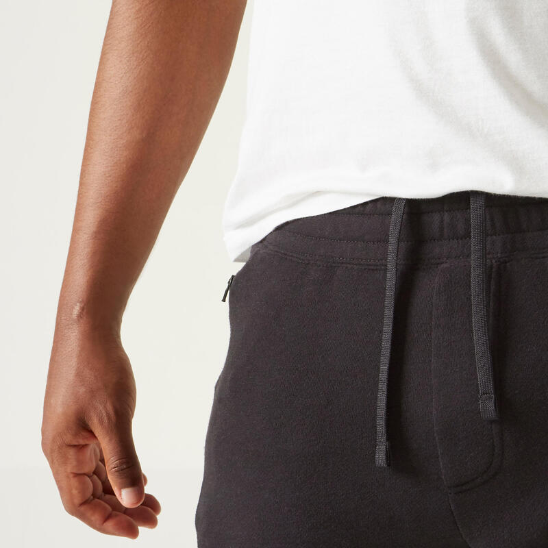 Pánské tepláky 500 Slim s kapsami na zip černé