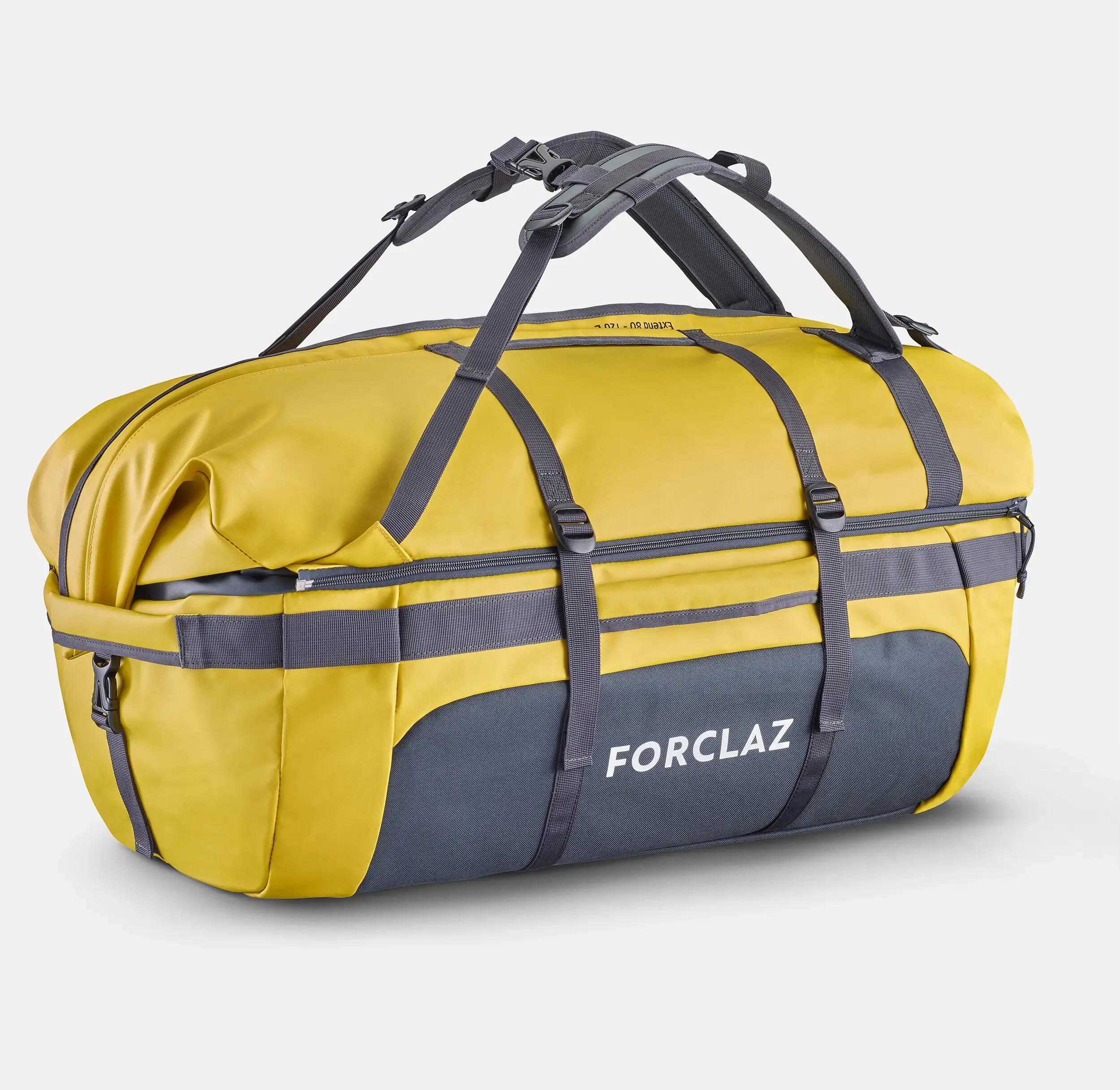 Een gele Extend 80/120L-tas voor trekking repareren