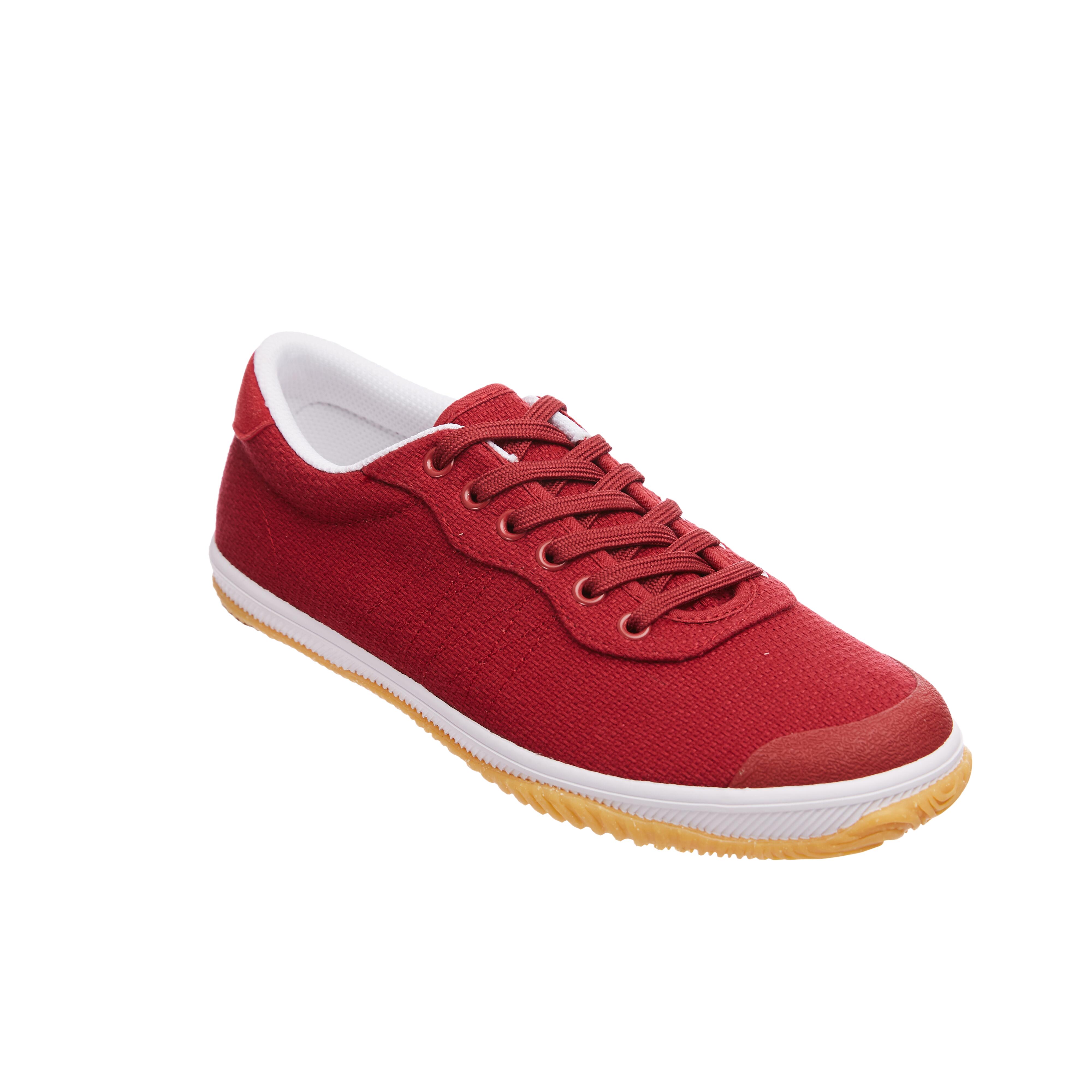 A pair of sports shoes on a colorful background. New sneakers on multi- colored background, copy space. Casual fashionable sneakers red colors.  Style c Stock Photo - Alamy