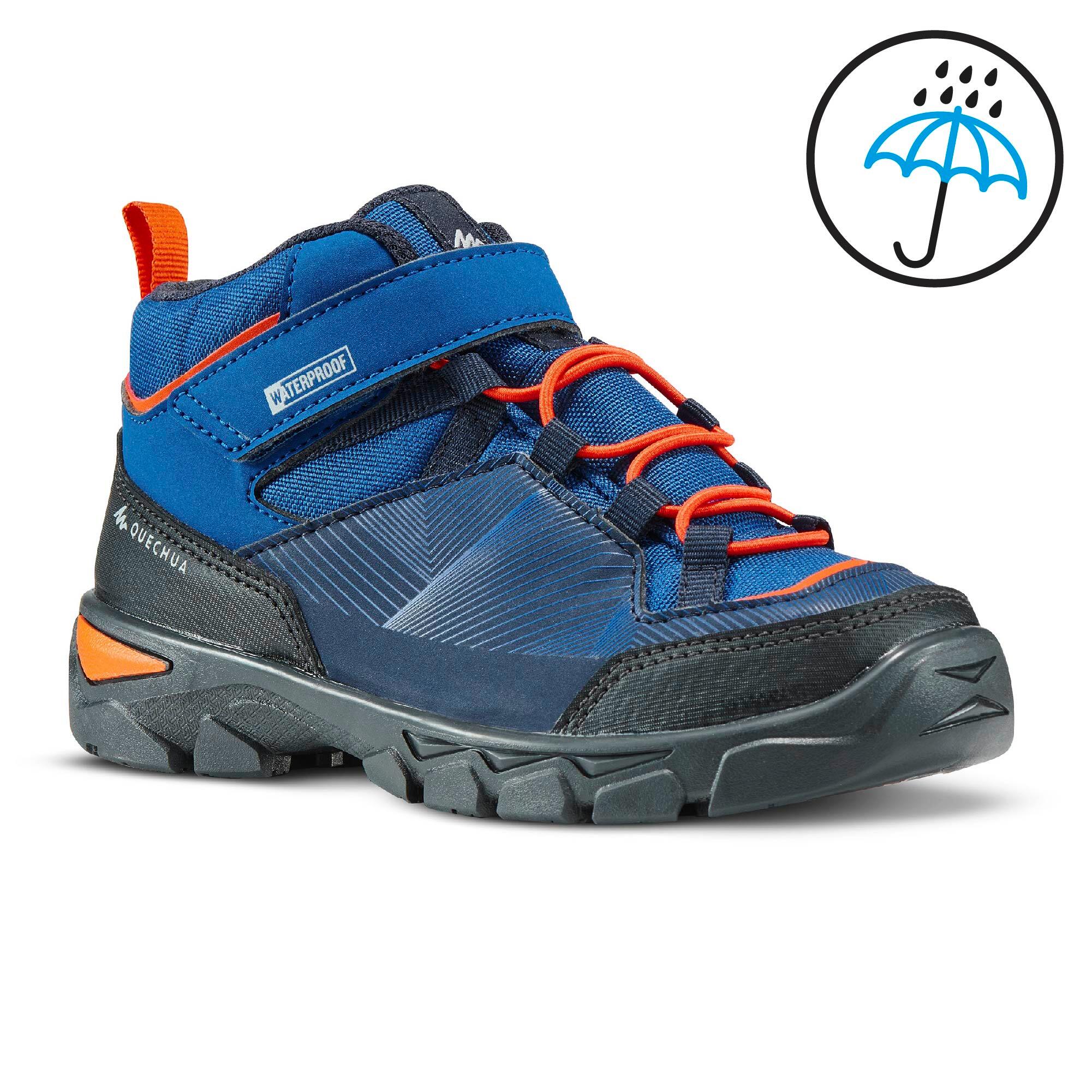 

Kids Hiking Shoes (Mid Ankle) MH120 Velcro - Blue -  By QUECHUA | Decathlon