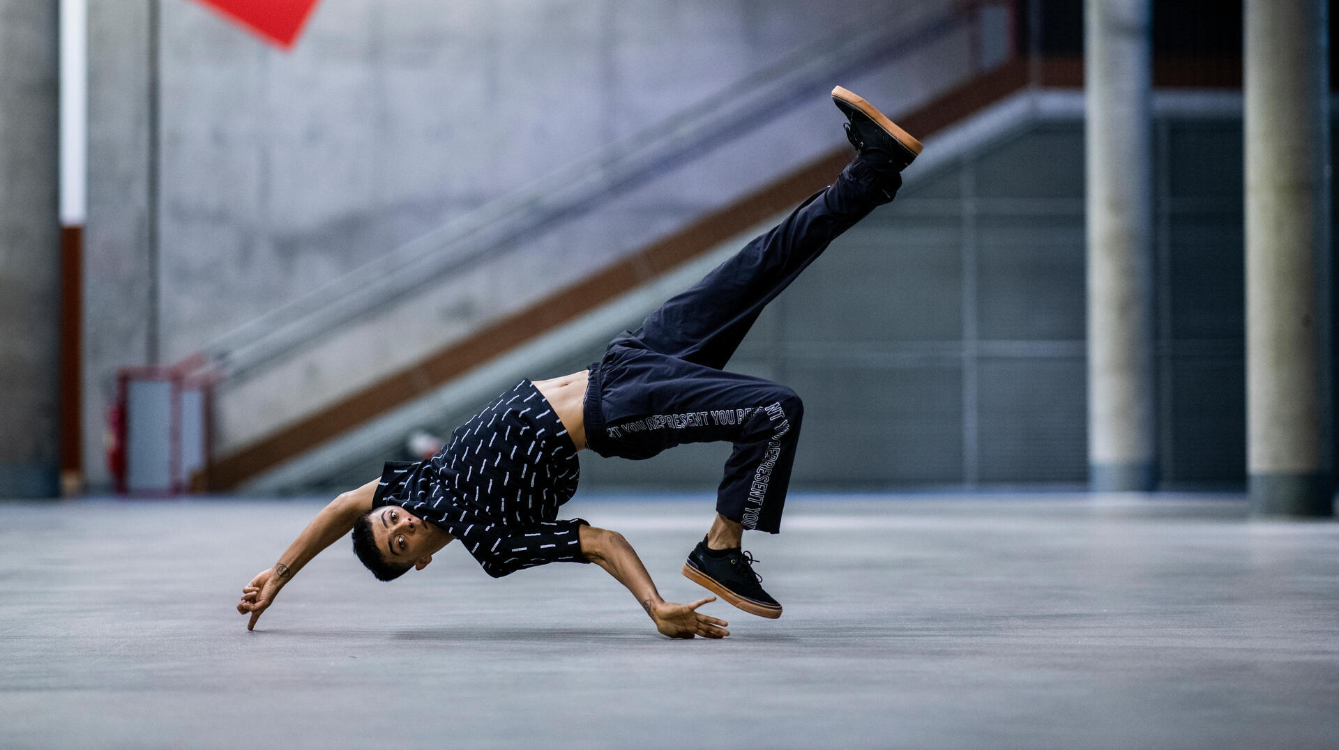 urban dancer doing a complex move