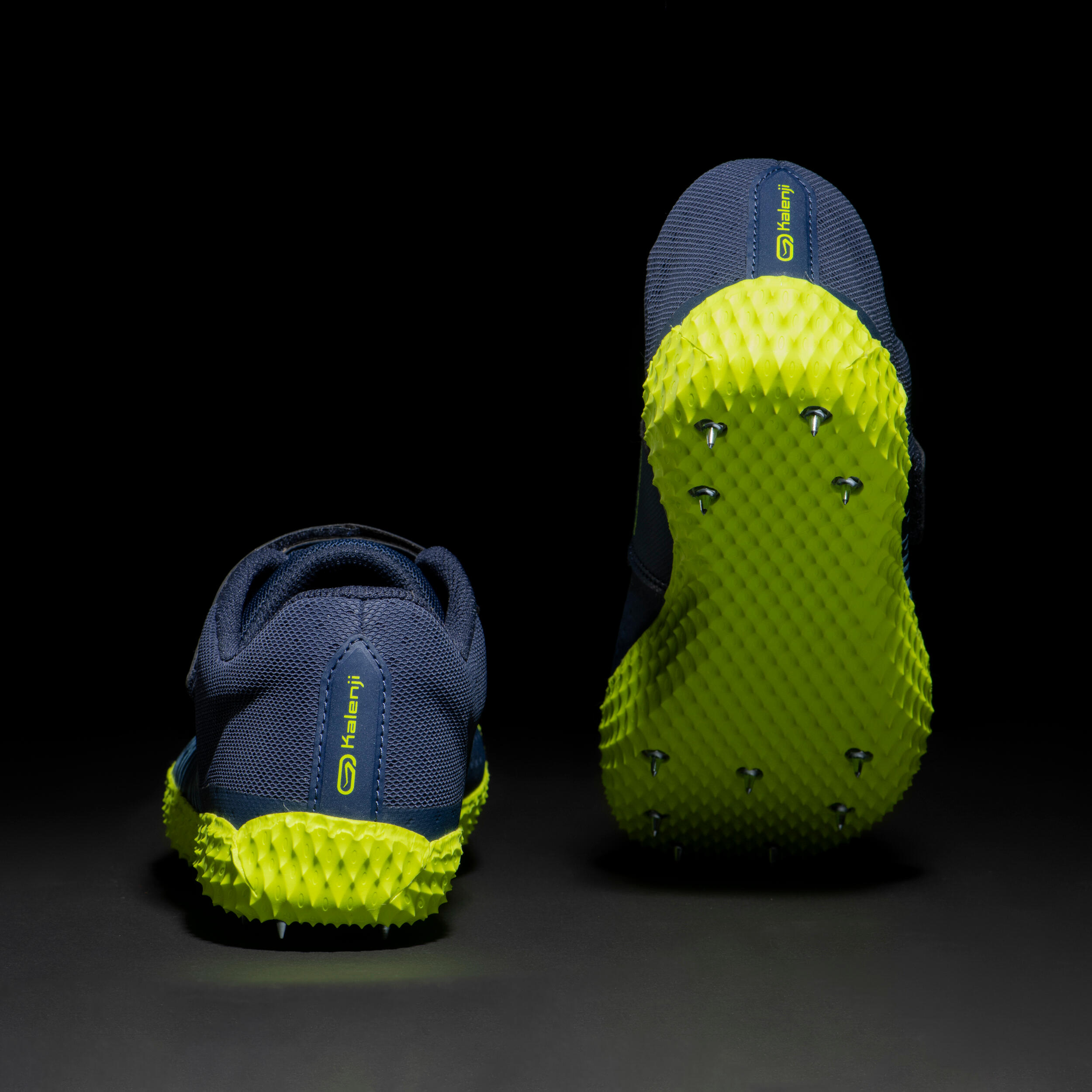 AT HIGH JUMP SPIKED SHOES SPECIFICALLY FOR THE HIGH JUMP 5/11