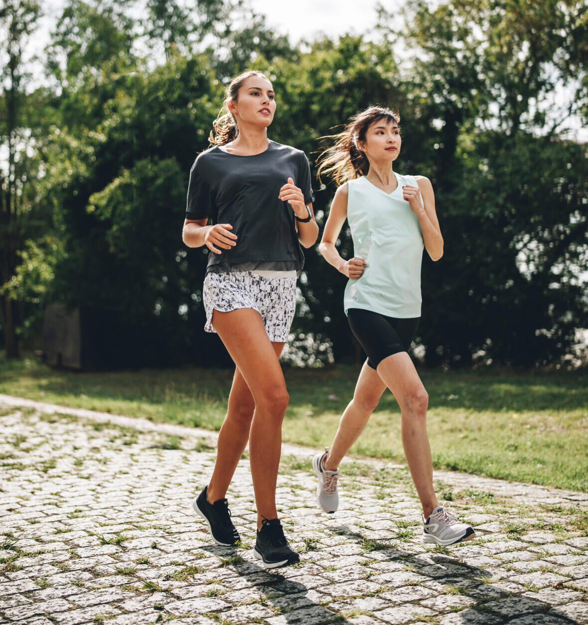 two women running