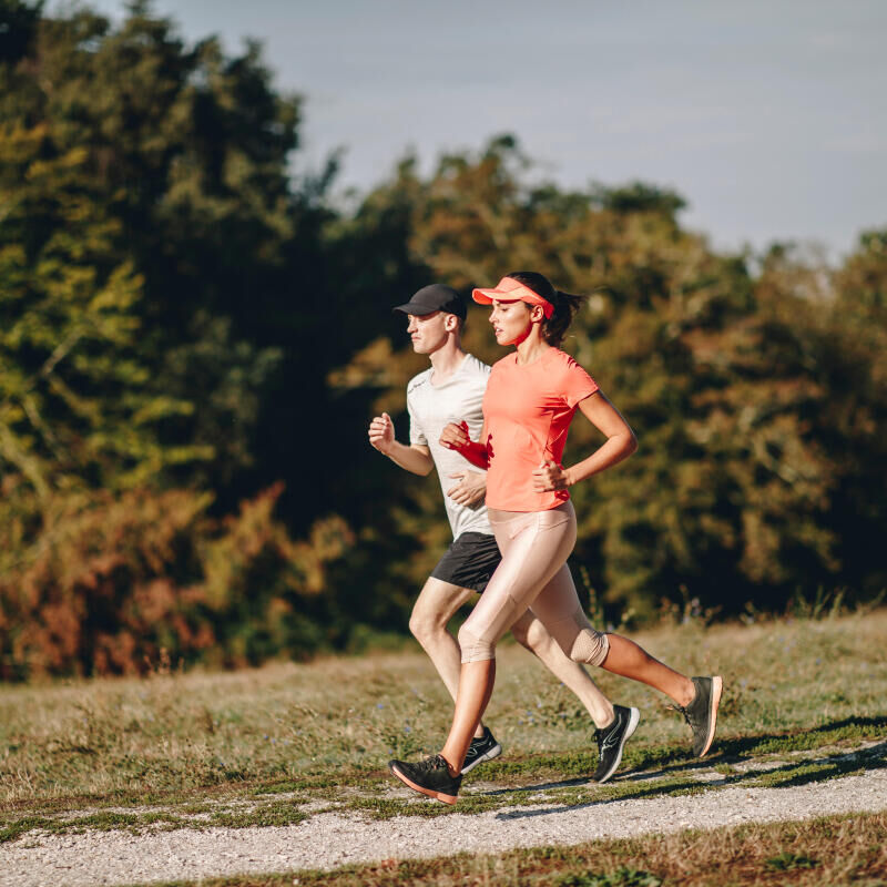 man and woman running 