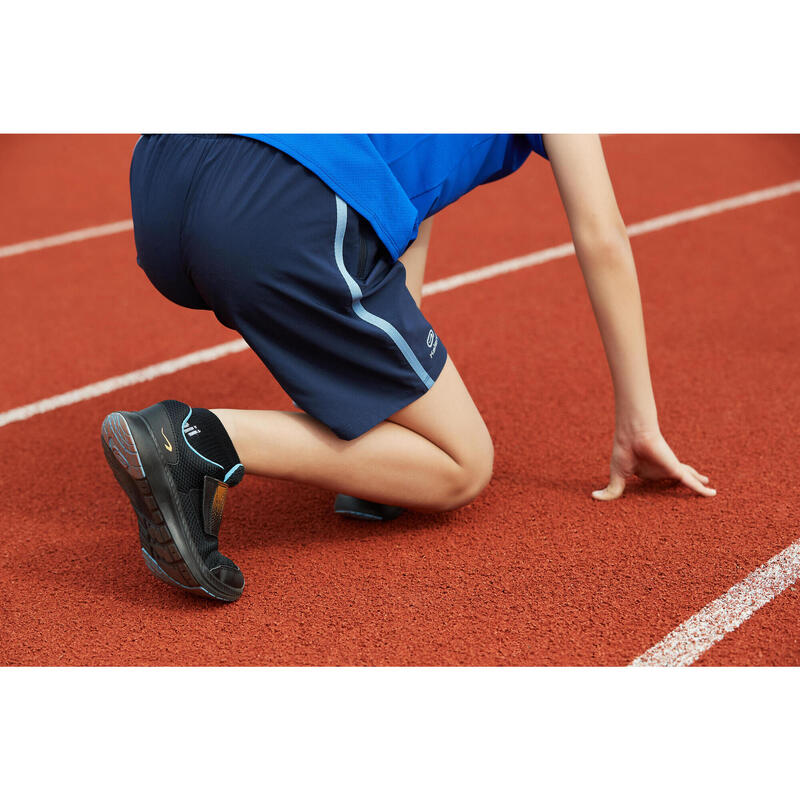 Baggy kindershort voor hardlopen of atletiek AT 100 marineblauw