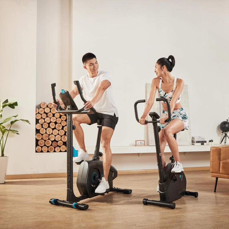 man and woman working out at home