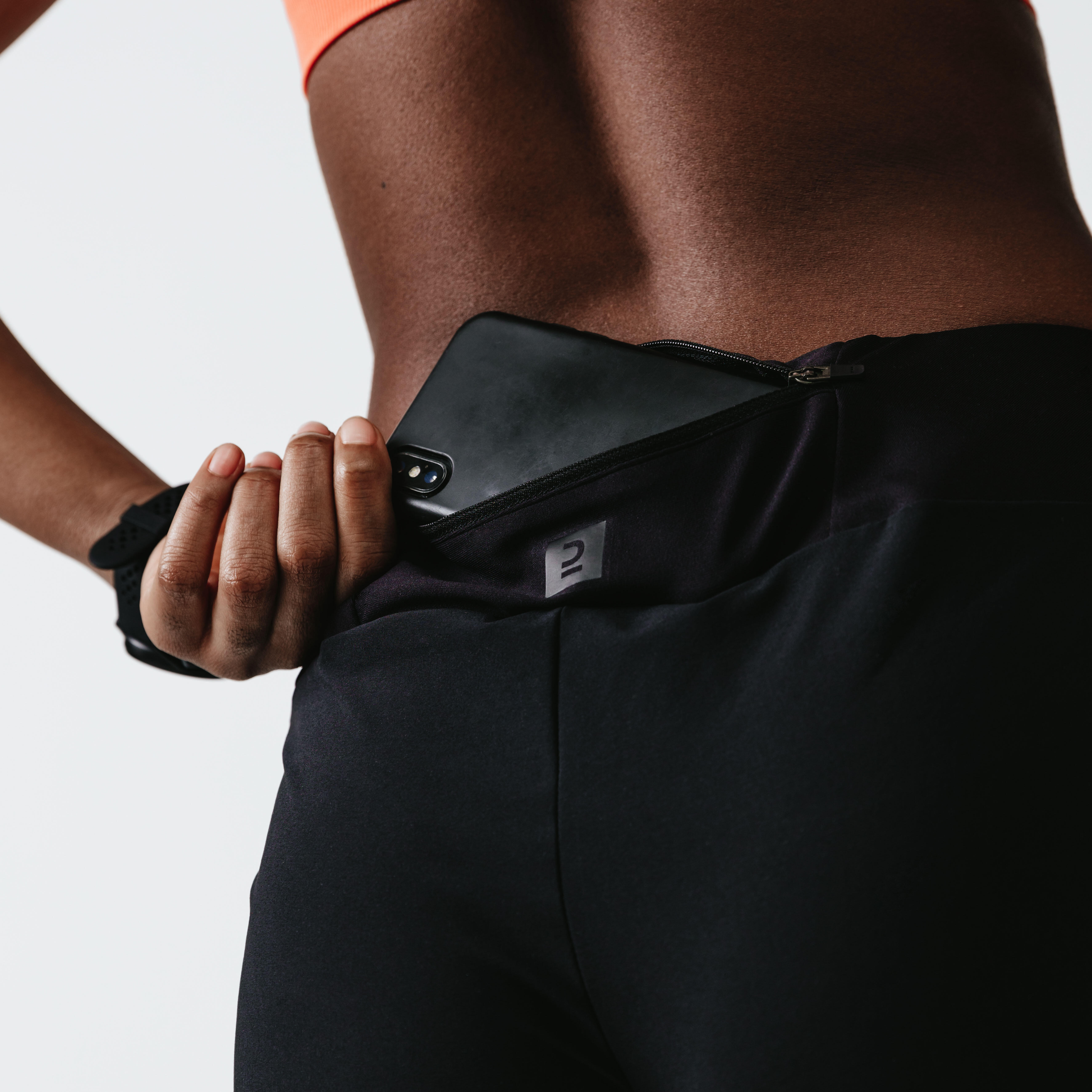 Pantaloncini da corsa da donna - KIPRUN Run 100 nero