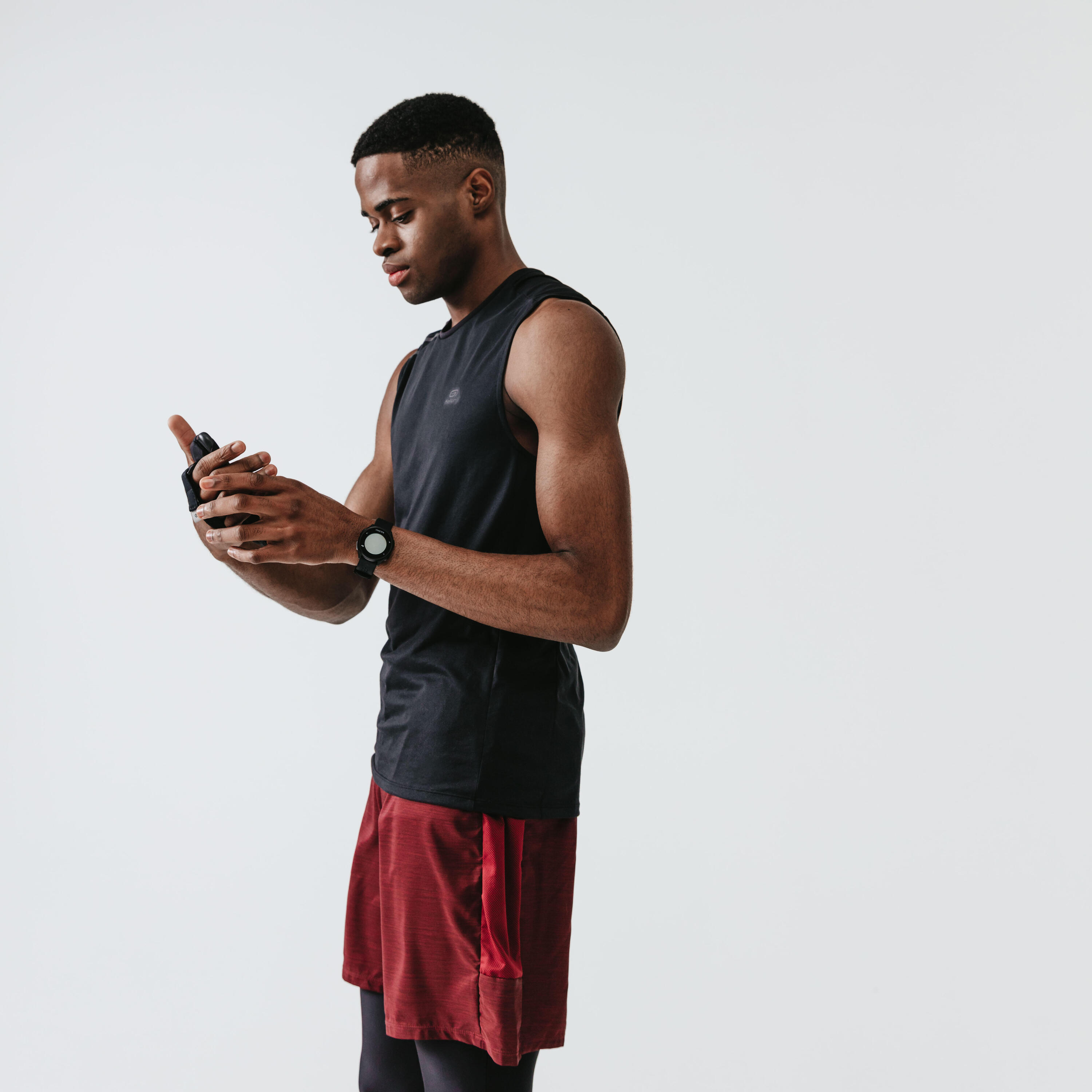 KALENJI DRY+ MEN'S BREATHABLE RUNNING SHORTS - MOTTLED BURGUNDY 5/8