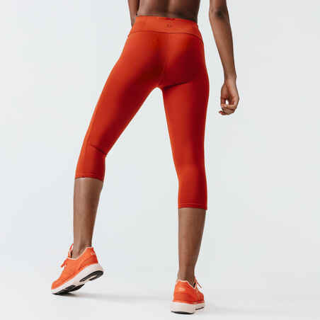 Oranžne ženske tekaške oprijete kratke hlače