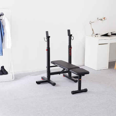 Tiltable and foldable weight bench with adjustable pegs