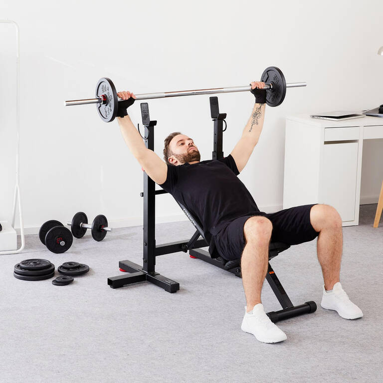 Tiltable and foldable weight bench with adjustable pegs