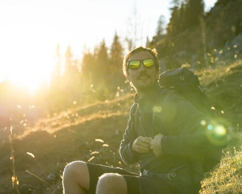 How should you clean your sunglasses?