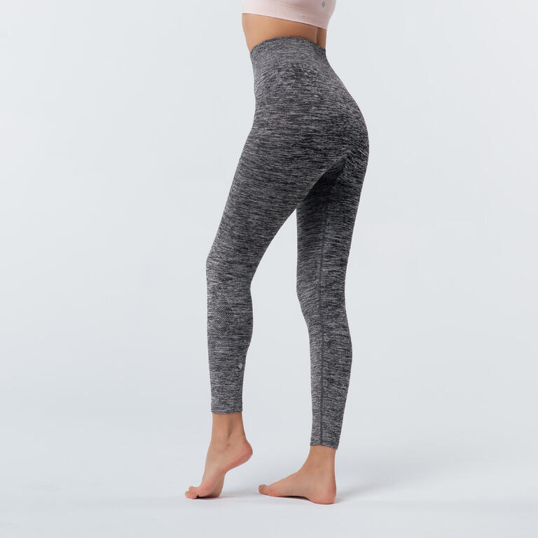 Women's grey seamless high-waisted yoga leggings in a fitted design