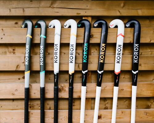 Korok Hockey sticks hanging from wooden wall