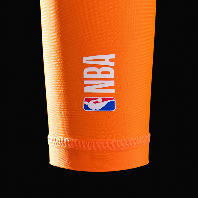 Shooting sleeve voor basketbal NBA New York Knicks E500 oranje