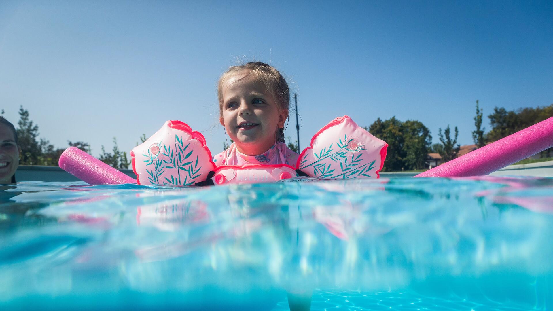 How can I help my child to learn to swim?