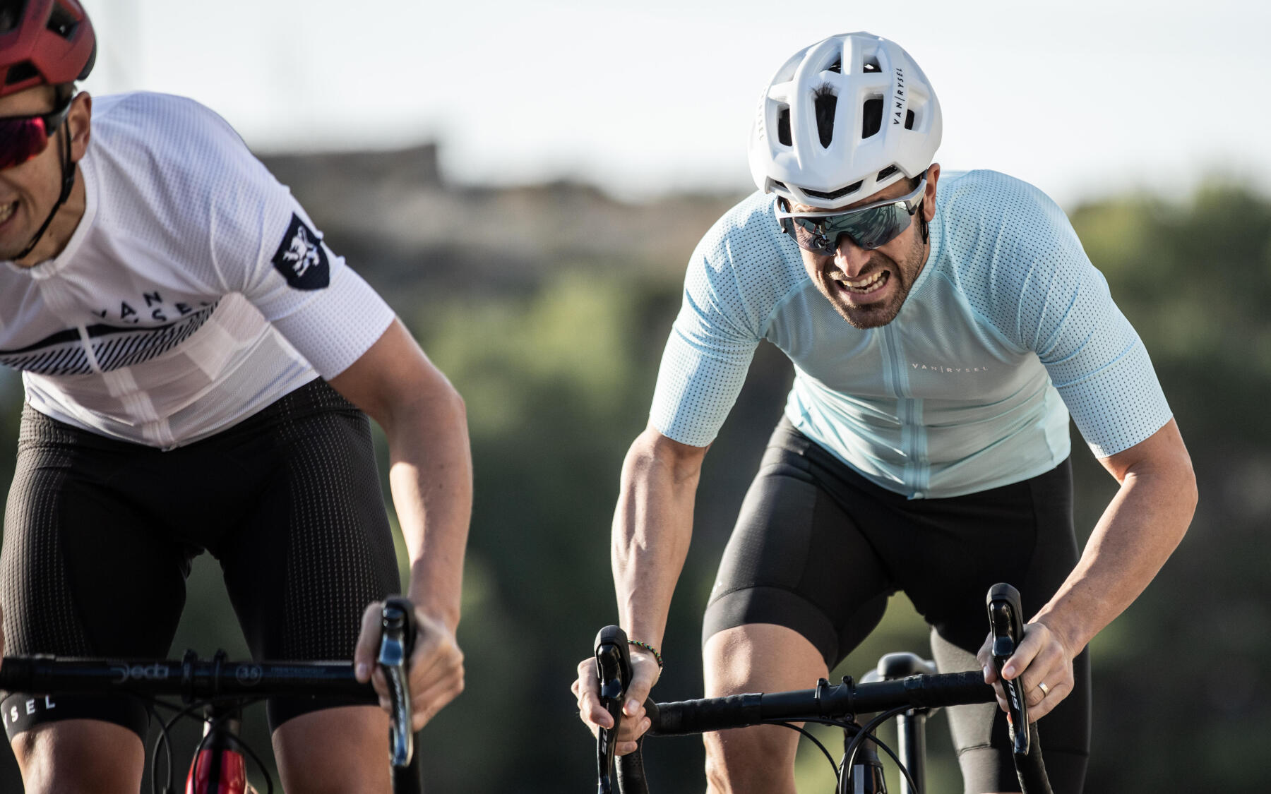 two cyclists on their bikes