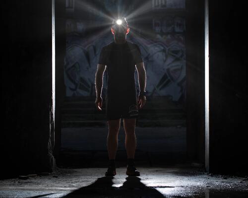 A runner wearing his headtorch