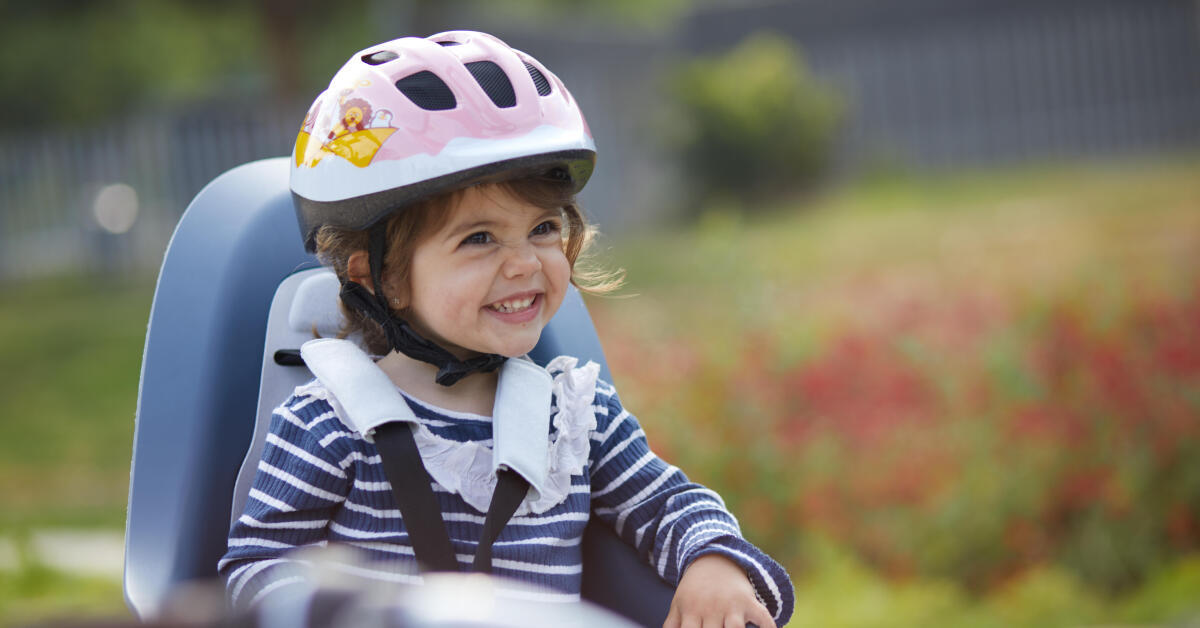 how old for baby to ride in bike seat