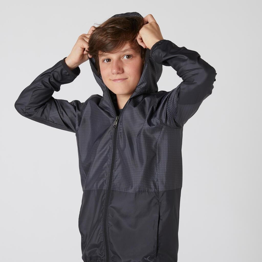 Chamarra ultra light compacta transpirable negro estampado NIÑOS 