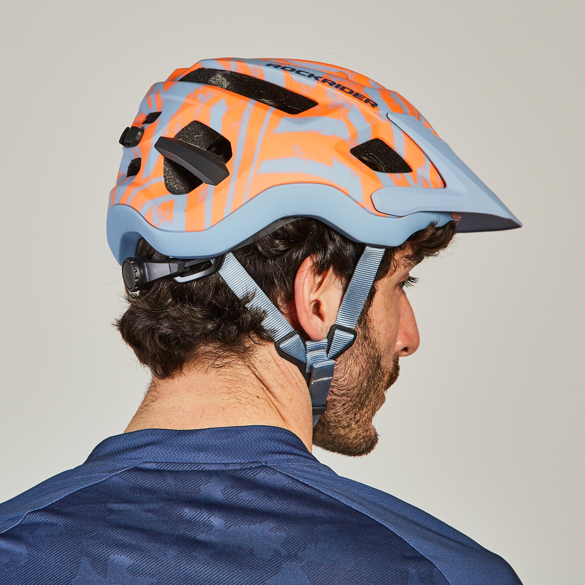 blue and orange bike helmet