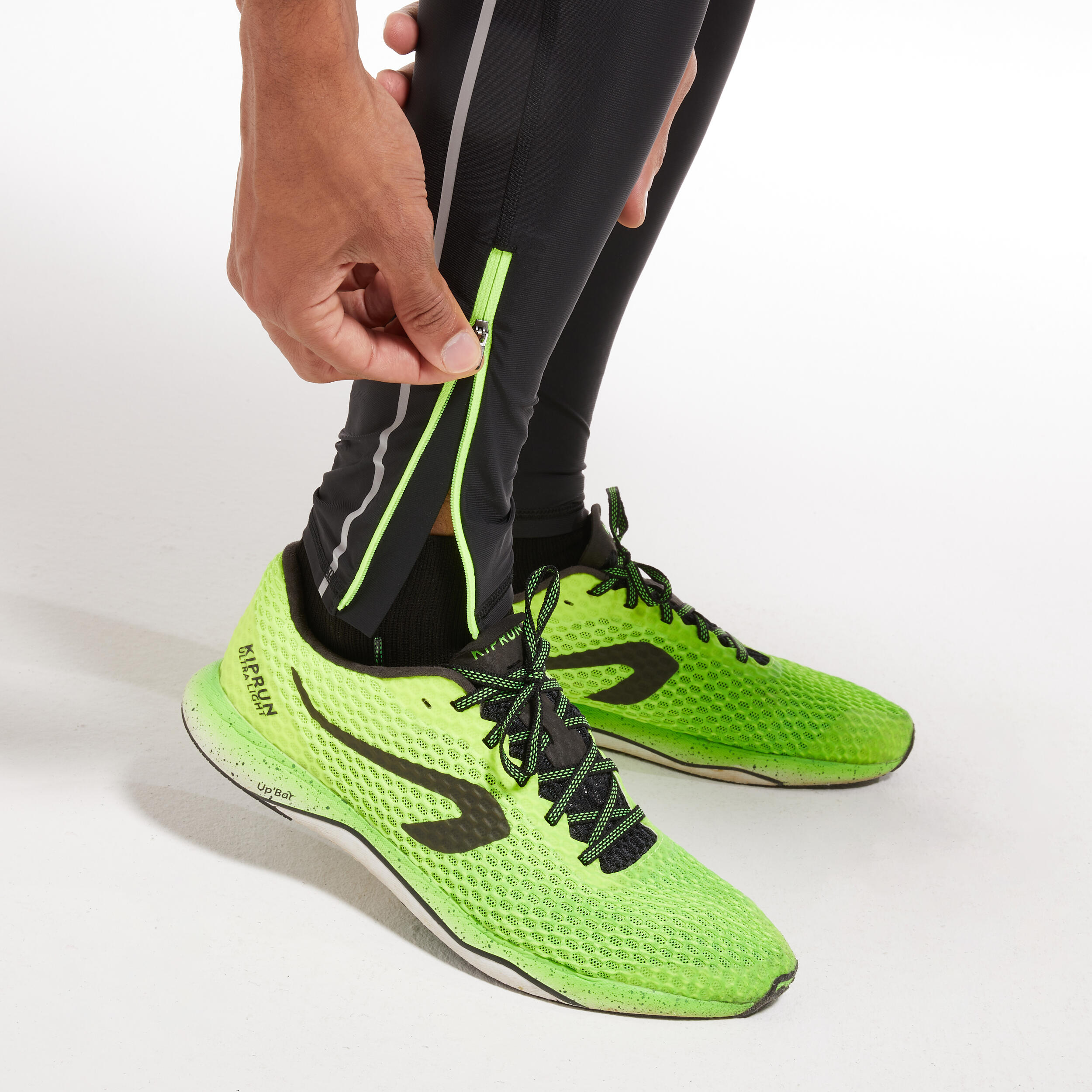 Pantaloni compressivi running uomo KIPRUN neri 10/12