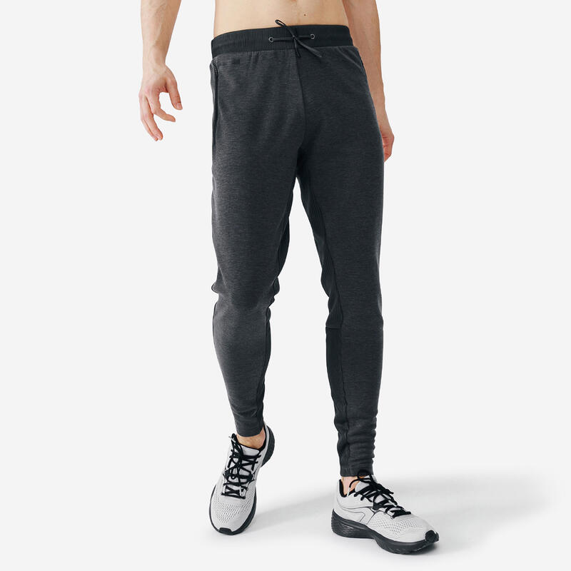 Pánské běžecké kalhoty Kalenji Warm+ šedé 