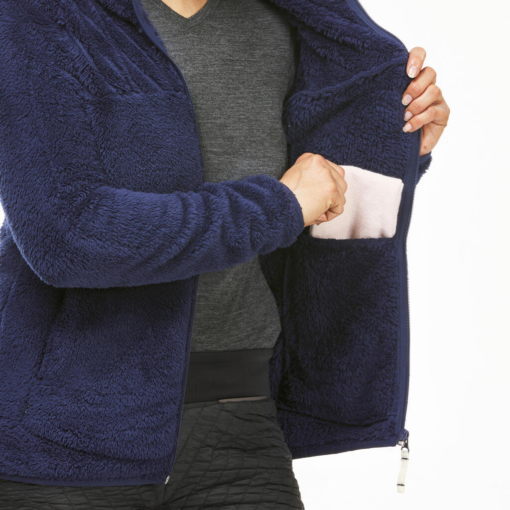 Chamarra de senderismo de forro polar cálida azul para mujer NH500