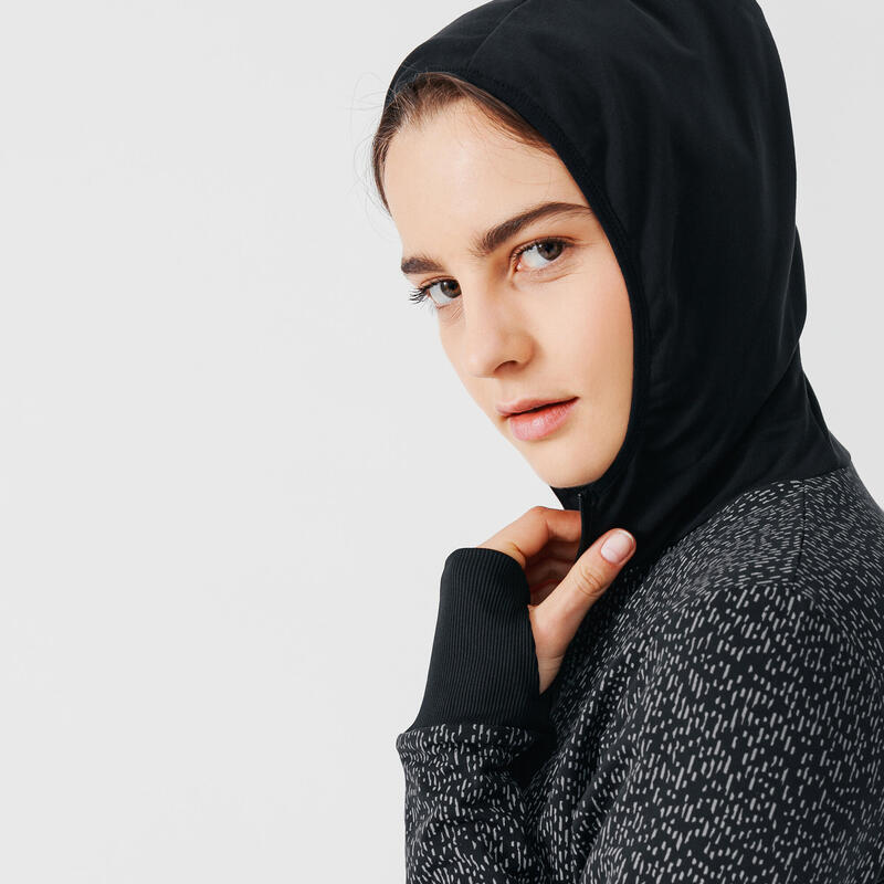 Veste running à capuche femme - Warm noir motifs réfléchissants