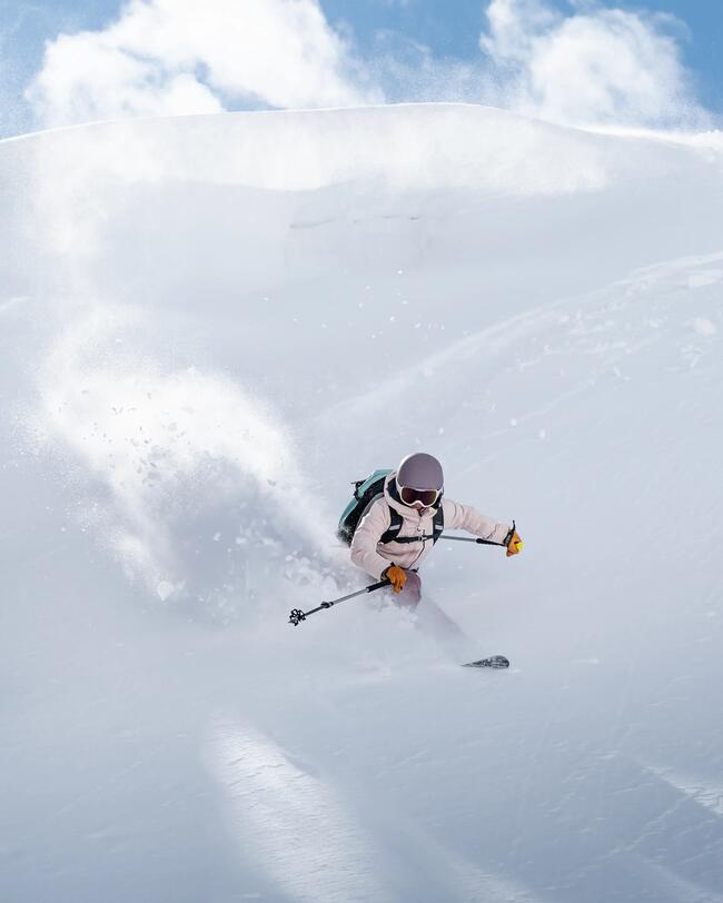 Person skiing in fresh snow